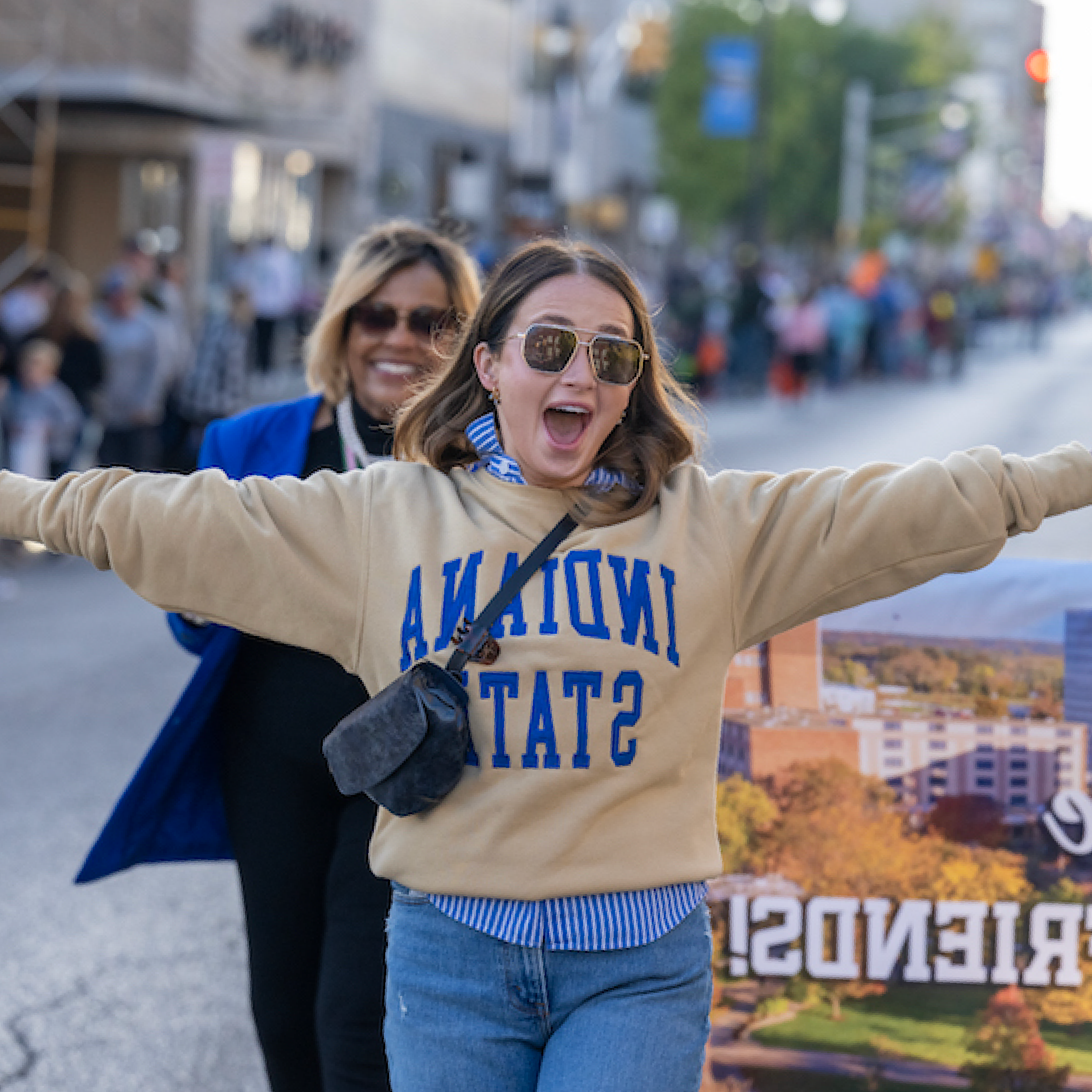 Alumni Board Member walking in the homecoming parade